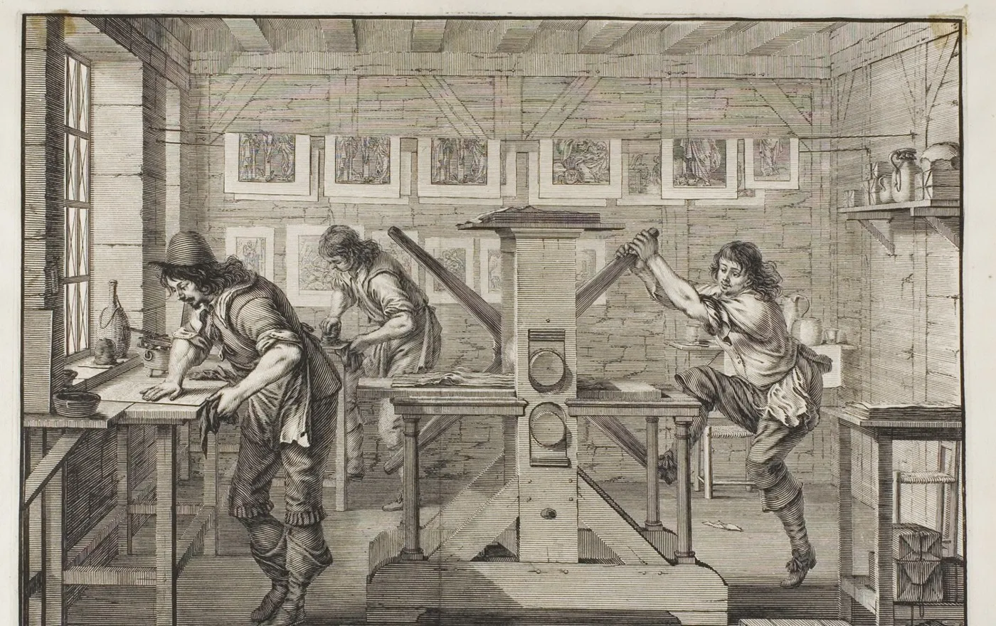 Etching of a print shop: one man pulls the arm of a rolling press while two others prepare plates.
